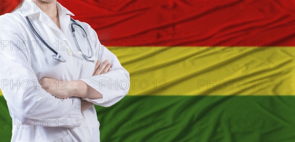 Doctor with crossed arms on Bolivia flag. Bolivia health and care concept. Female doctor on Bolivia flag