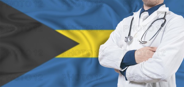 Bahamas healthcare concept. Male doctor on Bahamas flag. Doctor with crossed arms on Bahamas flag
