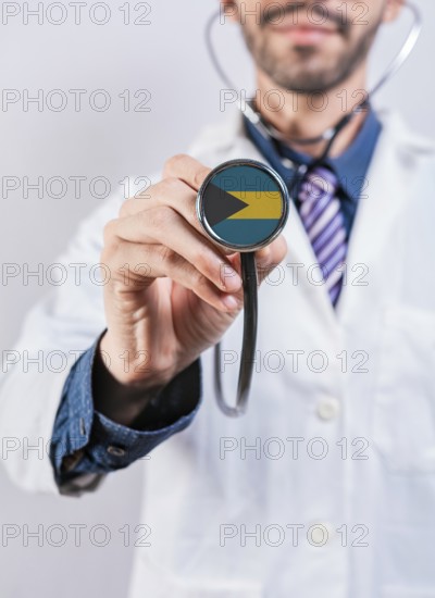 Bahamas health and medical insurance concept. Bahamas healthcare system, doctor holding stethoscope