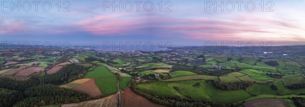 Twilight Sky of Torbay farms and fields from a drone, Totnes, Berry Pomeroy, Devon, England, United Kingdom