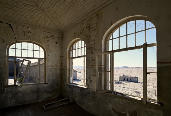 View into the desert from a former dwelling house, Kolmanskuppe, near Lüderitz, Karas Region, Namibia