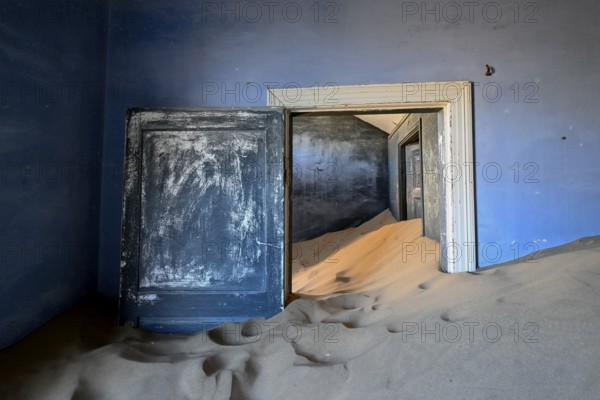 Sand mountains in a former dwelling house, interior photograph, Kolmanskop, restricted diamond area, near Lüderitz, Karas region, Namibia