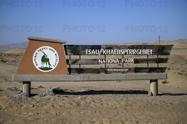 Sign at the entrance to Tsau//Khaeb National Park, near Kolmanskop, diamond restricted area, Karas Region, Namibia