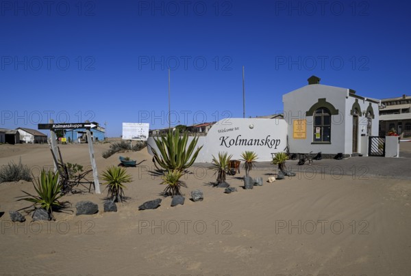 Entrance gate to the former diamond settlement of Kolmanskop, restricted diamond area, near Lüderitz, Karas region, Namibia