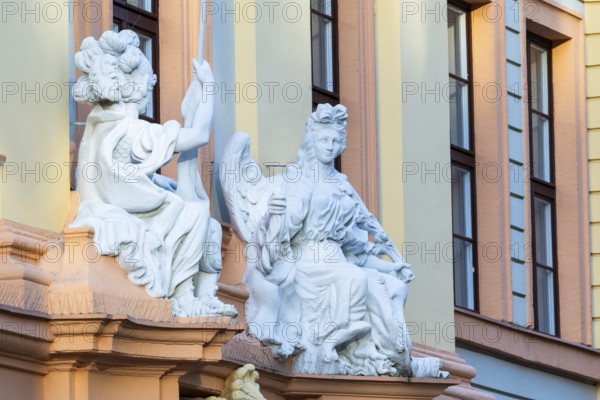 Statues above the entrance door at the Romanus House, Brühl, Leipzig, Saxony, Germany