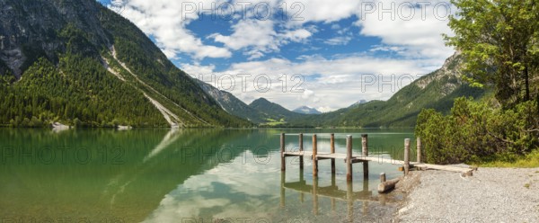 Jetty on Lake Heiterwanger See in the Ammergau Alps, Heiterwang near Reutte, Tyrol, Austria