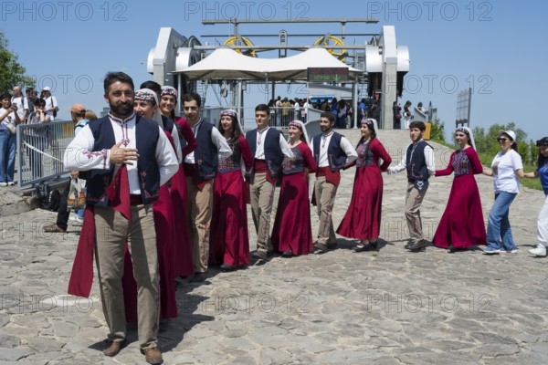 Group in traditional costumes at a festive gathering, folklore, Tatev, Tatev, Syunik province, Syunik, Armenia