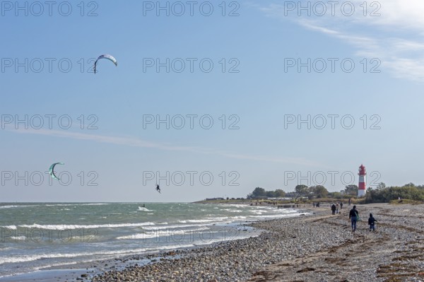 Lighthouse, beach, Baltic Sea, people, kitesurfer, kitesurfer jumps, Falshöft, Pommerby, Schleswig-Holstein, Germany