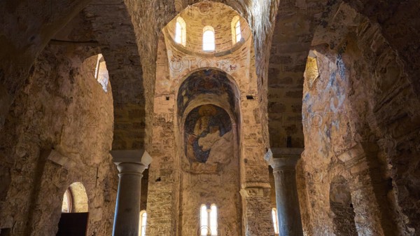 Church of Agia Sophia from the 14th century AD, interior of an old church with round arches and warm light, Mystras, Mistra, UNESCO World Heritage Site, Medieval Byzantine ruined city, north-west of Sparta, foothills of the Tyagetos Mountains, Peloponnese, peninsula, Greece