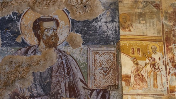 Post-Byzantine church of Agios Nikolaos from the 17th century AD, fresco of a saint with book, partly damaged by wear and tear, Mystras, Mistra, UNESCO World Heritage Site, Medieval Byzantine ruined city, north-west of Sparta, foothills of the Tyagetos Mountains, Peloponnese, peninsula, Greece