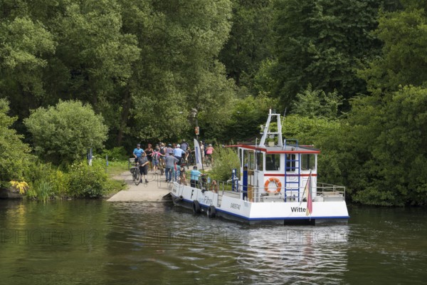 People at the Ruhr Valley ferry, Hardenstein Castle pier on the Ruhr, Herbede, Witten, Ruhr area, North Rhine-Westphalia, Germany
