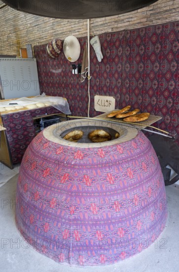 A traditional tandoor oven with bread, ready baked, oven, Tandoor, Tandur, Tonir, Martuni, Gegharkunik province, Armenia