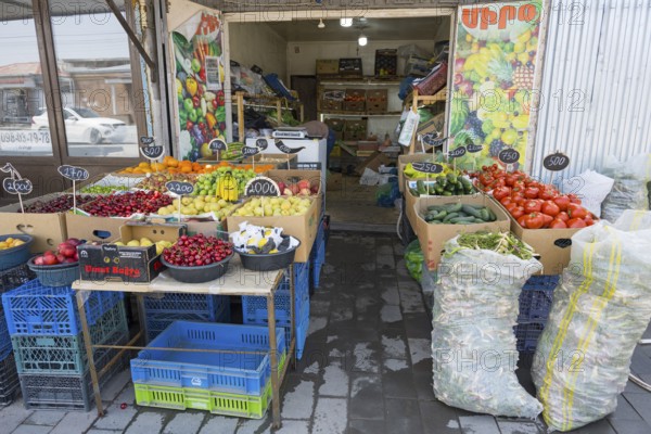A colourful fruit and vegetable stall with crates and price tags, Martuni, Gegharkunik province, Armenia