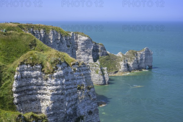 View of the Falaise d'Amont rock arch, hike from Yport to Etretat along the chalk cliff coast, Étretat, Département Seine-Maritime, France