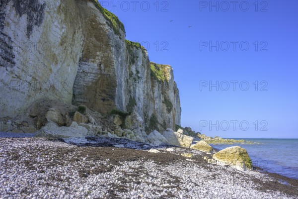 Cliffs on the beach at Valleuse d'Etigue, hike from Yport to Etretat along the chalk cliff coast, Seine-Maritime department, France