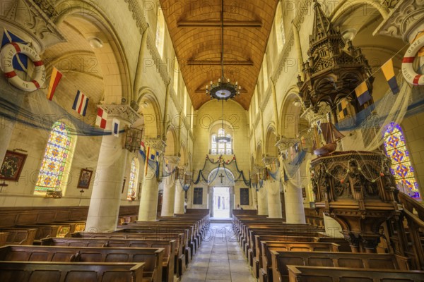 Church of Saint Martin decorated with flags and fishing nets, Yport, Département Seine-Maritime, France