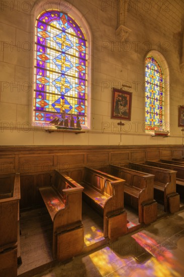Colourful stained glass windows in the church of Saint Martin, Yport, Département Seine-Maritime, France