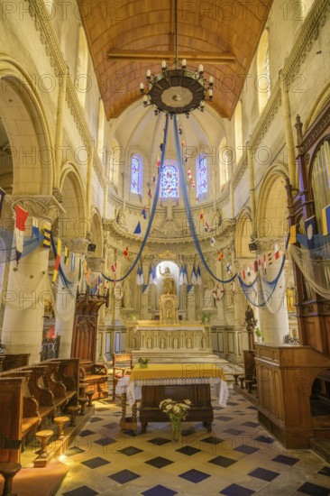 Church of Saint Martin decorated with flags and fishing nets, Yport, Département Seine-Maritime, France