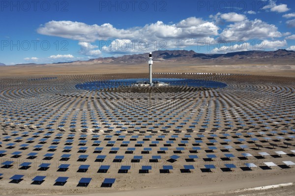 Tonopah, Nevada - The Crescent Dunes Solar Energy Project in the Nevada desert. Ten thousand mirrors reflect sunlight onto a tower where molten salt is heated to produce steam and generate electricity