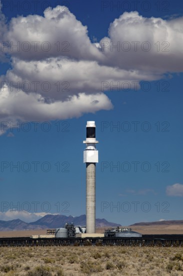 Tonopah, Nevada - The central receiver tower at Crescent Dunes Solar Energy Project in the Nevada desert. Ten thousand mirrors reflect sunlight onto the tower where molten salt is heated to produce steam and generate electricity