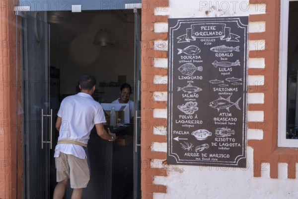 Restaurant, pub, bar, table with offers, food, fish, specialities, Tavira, Algarve, Portugal