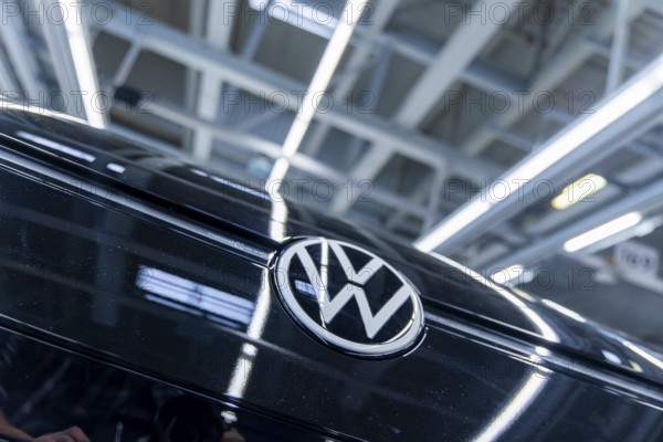 Electric car production in the assembly halls of VW in Zwickau. VW logo, Zwickau, Saxony, Germany