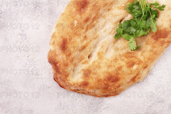 Georgian lavash bread, freshly baked, top view, on the table, no people