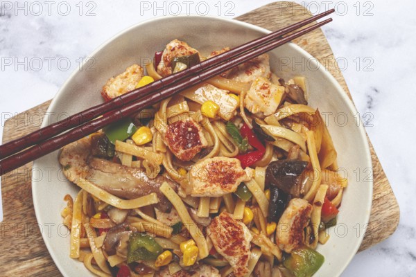 Fried noodles with chicken meat and vegetables, Bami Goreng, Indonesian dish, no people