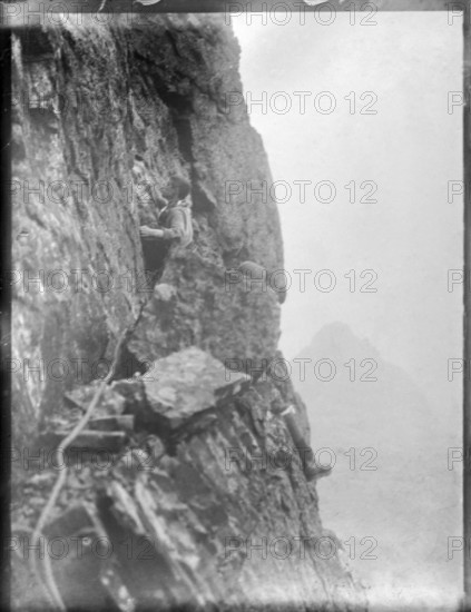Climber on rocks, Cuillin mountains, Skye, Scotland, UK c 1900-1920