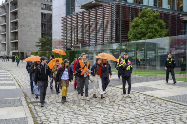 Activists of the New Generation walk to the Bundestag singing. Reichstagsufer, Berlin, 06.10.2025