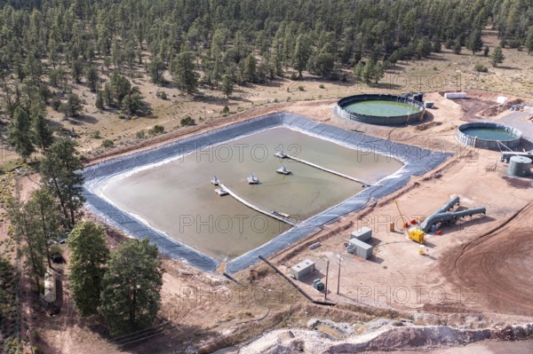 Tusayan, Arizona - A pond holding waste water at Energy Fuels' controversial Pinyon Plain uranium mine, located a few miles from Grand Canyon National Park and inside Baaj Nwaavjo I'tah Kukveni National Monument. Native American tribes fear contamination of ground water and pollution from trucks hauling uranium ore along the 300-mile route to Energy Fuels' White Mesa mill in Utah