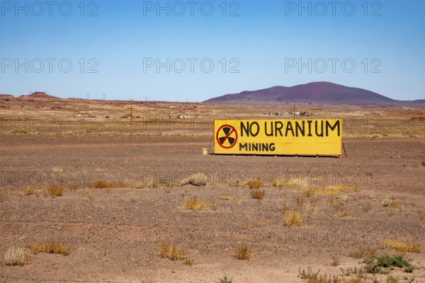 Cameron, Arizona - A sign on the Navajo Nation expresses opposition to Energy Fuels' controversial Pinyon Plain uranium mine, located a few miles from Grand Canyon National Park and inside Baaj Nwaavjo I'tah Kukveni National Monument. Native American tribes fear contamination of ground water and pollution from trucks hauling uranium ore along the 300-mile route to Energy Fuels' White Mesa mill in Utah
