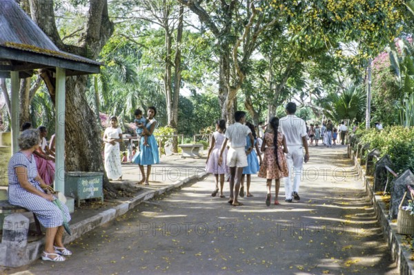 Families strolling in garden at zoo, Colombo, Sri Lanka, South Asia, Indian subcontinent, South Asia, 1965