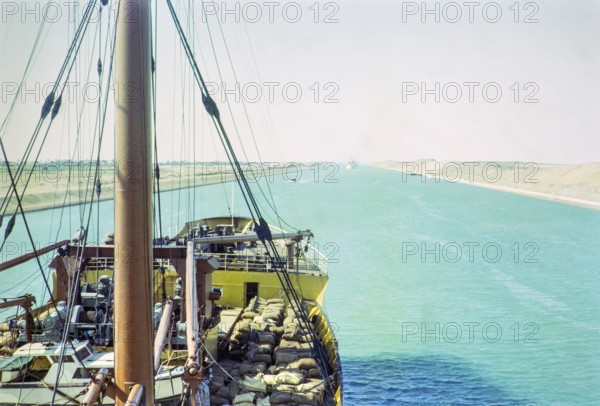 Shipping passing through the Suez Canal photographed onboard a cargo ship, Egypt, norther Africa 1965