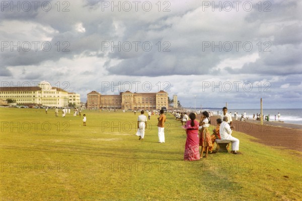 People enjoying leisure activities by the ocean, Galle Face Green, Colombo, Sri Lanka, South Asia, Indian subcontinent, South Asia, 1965