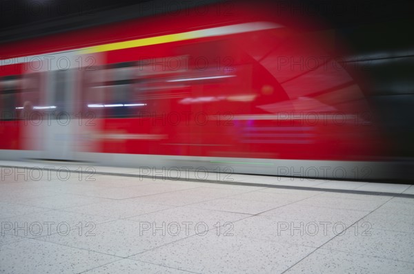 Underground arriving S-Bahn, train, class 420 in traffic red, platform, stop, station city centre, public transport, movement effect, VVS, Verkehrsverbund Stuttgart, local transport, Stuttgart, Baden-Württemberg, Germany