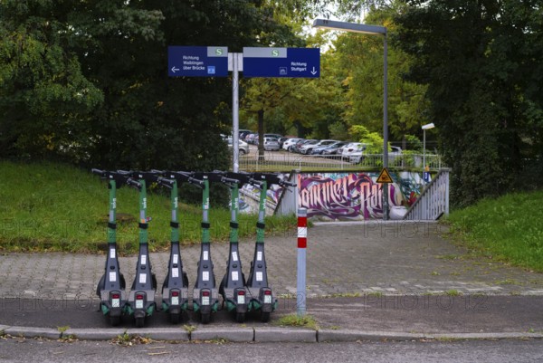 Several e-scooters, electric scooters, scooters parked on the pavement, pavement, in the Bolt bike hire shop, S-Bahn, Sommerrain stop, Stuttgart, Baden-Württemberg, Germany