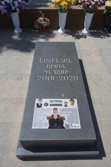 A gravestone with flowers, inscription and decorative details, Sardarapat monument, Araks village, Armavir province, Armenia