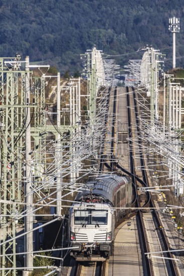 Deutsche Bahn AG high-speed railway line between Stuttgart and Ulm. New railway line with InterRegioExpress IRE200 of Deutsche Bahn AG with overhead lines and railway technology. Kirchheim unter Teck, Baden-Württemberg, Germany