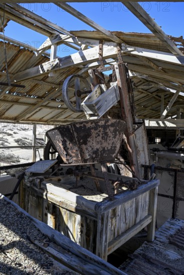 Drum sieve for sieving diamonds in a derelict building, Pomona, restricted diamond area, near Lüderitz, Karas region, Namibia