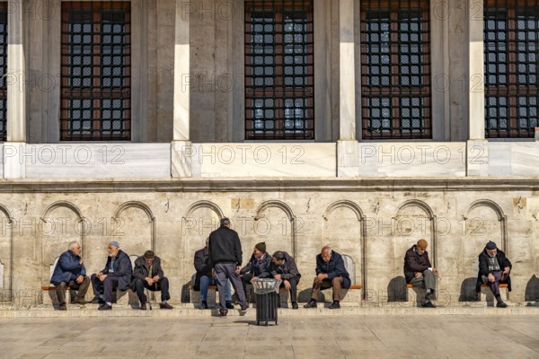 Muslims at the washbasins for the Wudu' ablution of the Fatih Mosque in Fatih, Istanbul, Turkey