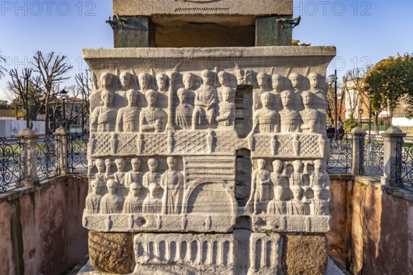 Marble base of the ancient Egyptian Obelisk of Theodosius or Obelisk of Istanbul with reliefs on the Hippodrome in Istanbul, Turkey