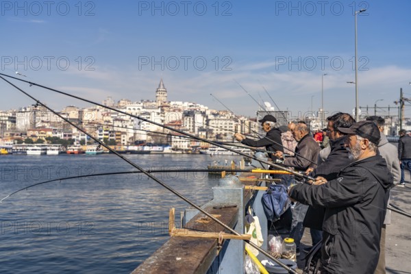 Angler on the Galata Bridge in Istanbul, Turkey