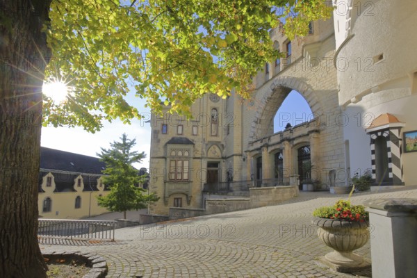 Entrance with portal and backlight to the castle, archway, guardhouse, landmark, mood lighting, Hohenzollern Castle, Sigmaringen Castle, Swabian Alb, Baden-Württemberg, Germany