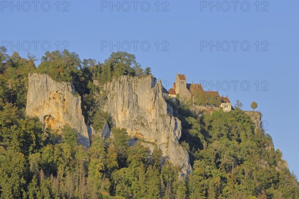 Werenwag Castle on the mountain with rock formations, cliffs, forest, landscape, light mood, castle, Langenbrunn, Beuron, Upper Danube Valley, Swabian Alb, Baden-Württemberg, Germany