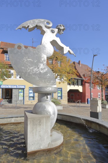 Sculpture guardian angel by Jürgen Goertz, modern art, water basin, fountain, shiny angel with index finger, silver, aluminium, fountain gallery, Adenauerplatz, Wiesloch, Baden-Württemberg, Germany