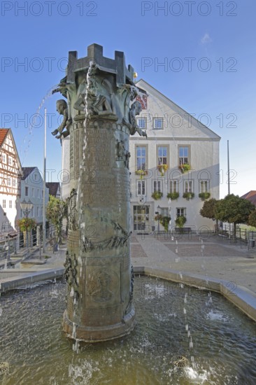 Town hall fountain with reliefs and figures by Klaus Ringwald 1998, water features, market square, Hechingen, Swabian Alb, Baden-Württemberg, Germany