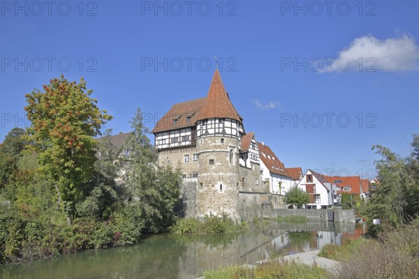 Zollern Castle built around 1255 with water tower on the Eybach stream, half-timbered house, autumn, castle, Balingen, Swabian Alb, Baden-Württemberg, Germany