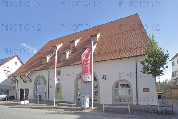 Historic tithe barn with flags, museum, tithe barn, Balingen, Swabian Alb, Baden-Württemberg, Germany