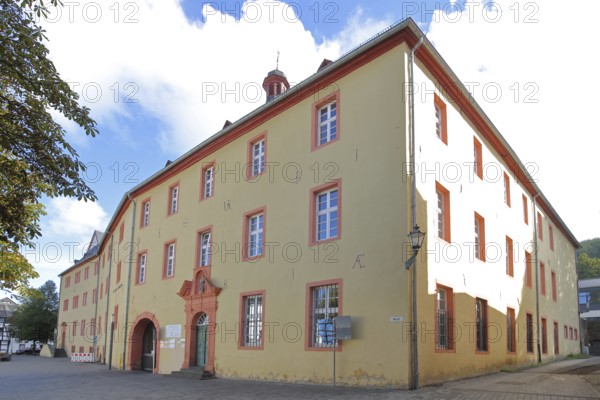 Yellow St Michael Grammar School, building, Bad Münstereifel, Ahrgebirge, Eifel, North Rhine-Westphalia, Germany